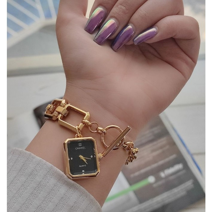 ساعت مچی زنانه بند استیل قفل تی مدل اویز رنگ ثابت شنل Chanel