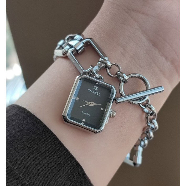 ساعت مچی زنانه بند استیل قفل تی مدل اویز رنگ ثابت شنل Chanel