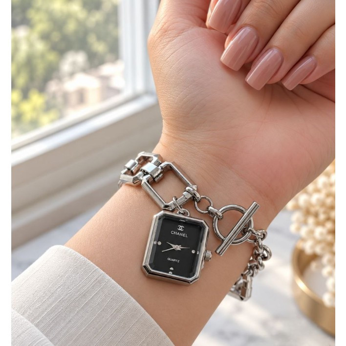 ساعت مچی زنانه بند استیل قفل تی مدل اویز رنگ ثابت شنل Chanel